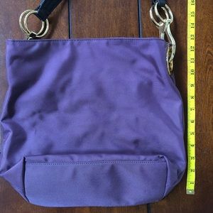 Plum colored purse w/ gold detail & leather strap